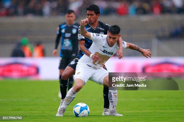 Pablo Lopez of Pachuca fights for the ball with Felipe Mora of Pumas during the fourth round match between Pumas UNAM and Pachuca as part of the...