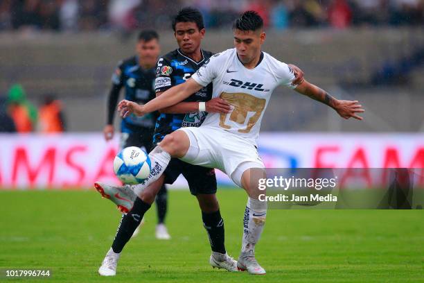 Pablo Lopez of Pachuca fights for the ball with Felipe Mora of Pumas during the fourth round match between Pumas UNAM and Pachuca as part of the...