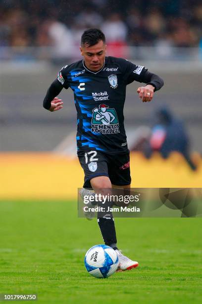 Emmanuel Garcia of Pachuca drives the ball during the fourth round match between Pumas UNAM and Pachuca as part of the Torneo Apertura 2018 Liga MX...