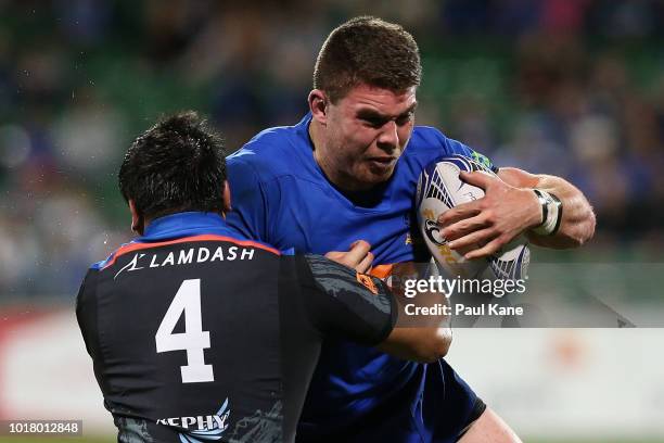 Harrison Orr of the Force gets tackled by Kotaro Yatabe of the Wild Knights during the World Series Rugby match between the Force and Wild Knights at...