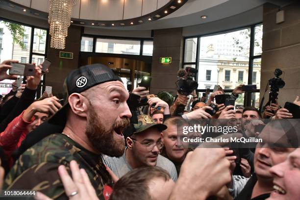 Tyson Fury points his finger at rival boxer Deontay Wilder as they goad one another following Fury's weigh in for his fight with Francesco Pianeta on...