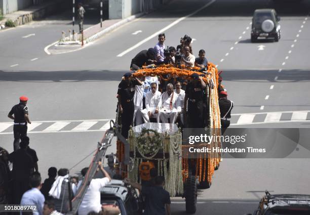Former Prime Minister Atal Bihari Vajpayee's funeral procession at Tilak Marg crossing on August 17, 2018 in New Delhi, India. Vajpayee the first...
