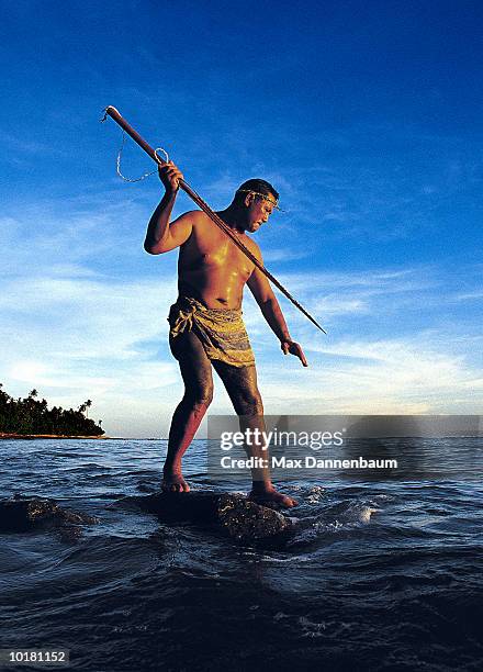 samoan man (35-40) spearfishing - samoa stock pictures, royalty-free photos & images