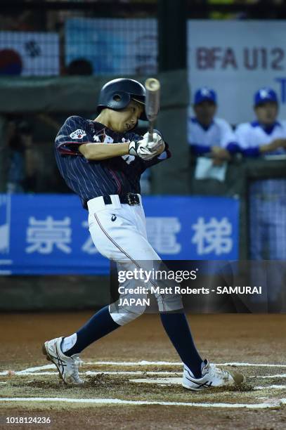 Yamato Nishimura of Japan bats in the top of the first inning during the BFA U-12 Asian Championship Super Round match between South Korea and Japan...