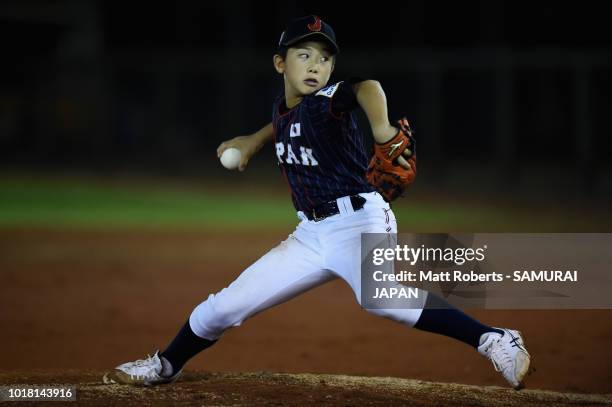 Rui Tomoda of Japan throws a pitch in the bottom of the third inning during the BFA U-12 Asian Championship Super Round match between South Korea and...