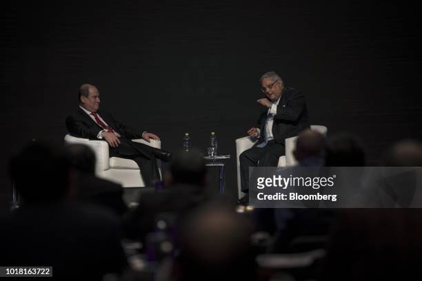 Alberto Triulzi, chief financial officer of IC Power Ltd., right, speaks while Melvin Escudero, chief executive officer of El Dorado Investments,...