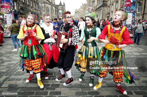 Performers from the Greene Shoots Theatre, entertain the crowds on the Royal Mile, during the Edinburgh Festival 2018.