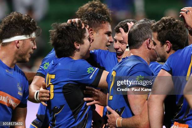 Jack McGregor of the Force celebrate a try with team mates during the World Series Rugby match between the Force and Wild Knights at nib Stadium on...