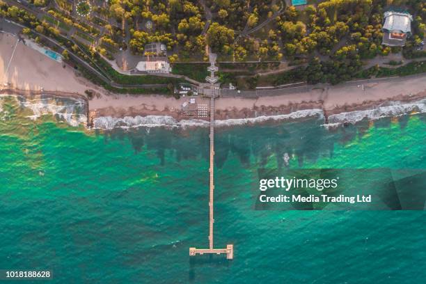 drone aerial eagle eye view over the bridge in burgas, bulgaria sea garden - burgas bulgaria stock pictures, royalty-free photos & images