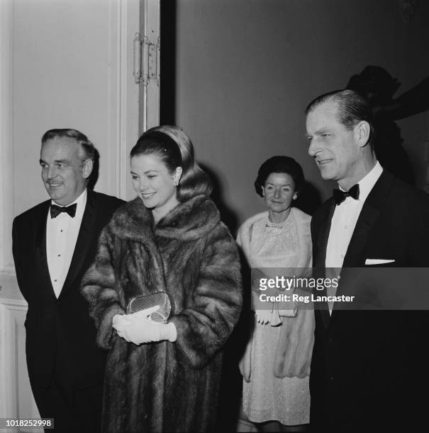 Rainier III, Prince of Monaco with his wife, American actress Grace Kelly , and Prince Philip at the Opéra de Monte-Carlo, Monaco, 15th December 1966.