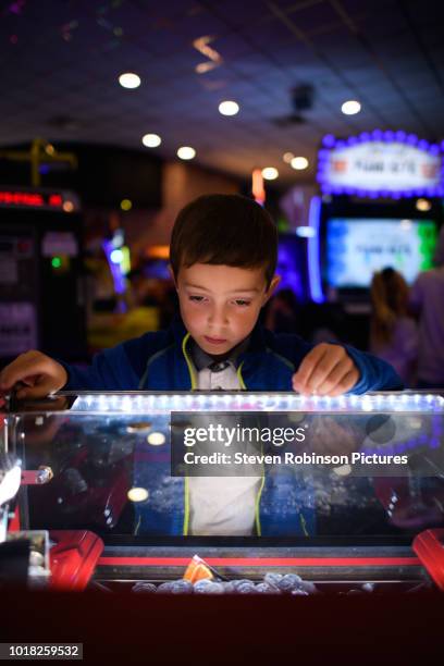 Boy in Amusment Arcade