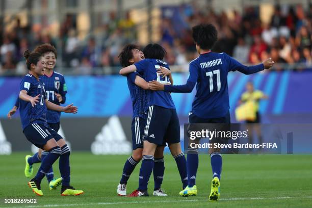 Jun Endo of Japan celebrates scoring the opening goal with her team mates during the FIFA U-20 Women's World Cup France 2018 Quarter Final quarter...