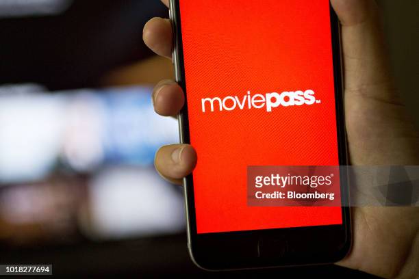 The MoviePass application is displayed on an Apple Inc. IPhone in an arranged photograph taken in Washington, D.C., U.S., on Friday, Aug. 17, 2018....
