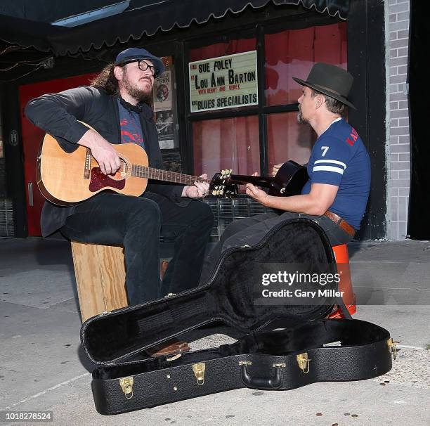 Ben Dickey and Ethan Hawke perform outside at the Continental Club to promote the new film "Blaze" on August 17, 2018 in Austin, Texas.