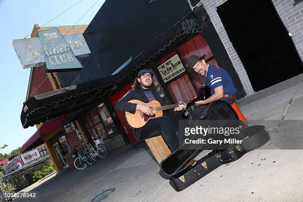 Ben Dickey and Ethan Hawke perform outside at the Continental Club to promote the new film "Blaze" on August 17, 2018 in Austin, Texas.