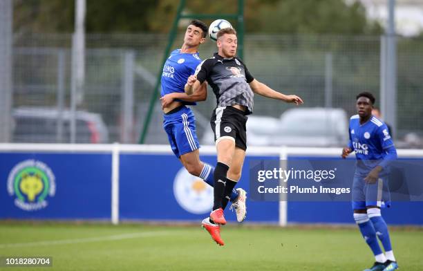 Alex Pascanu of Leicester City in action with Ben House of Reading during the Premier League International Cup tie between Leicester City and Reading...