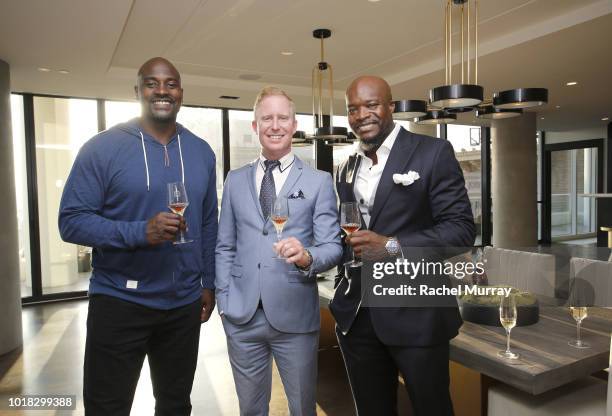 Marcellus Wiley, Ron Newman, and Kofi Nartey attend The Nartey Group presents a Sellebrity Toast at Above the Penthouse in The W Residences on August...