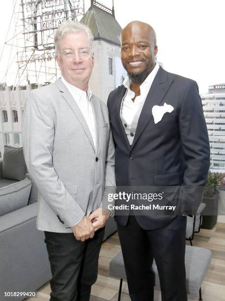 Peter Stuguard and Kofi Nartey attend The Nartey Group presents a Sellebrity Toast at Above the Penthouse in The W Residences on August 16, 2018 in...