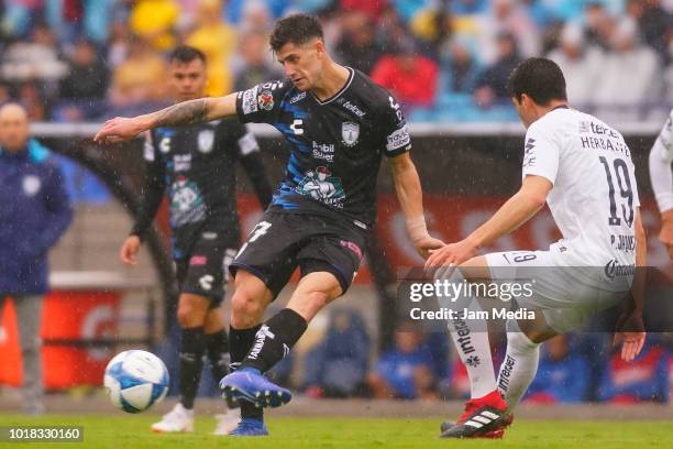 Angelo Sagal of Pachuca and Francisco Figueroa of Pumas fight for the ball during the fourth round match between Pumas UNAM and Pachuca as part of...