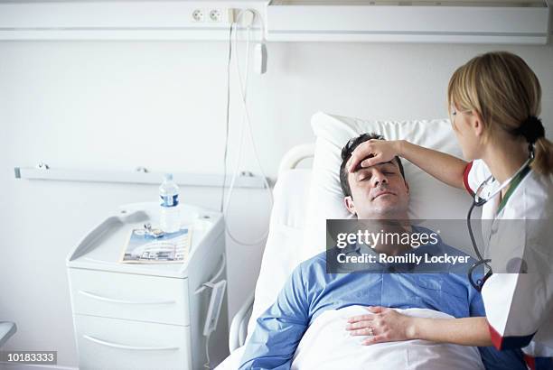 Nurses Fever Fever Patient Photos and Premium High Res Pictures - Getty Images