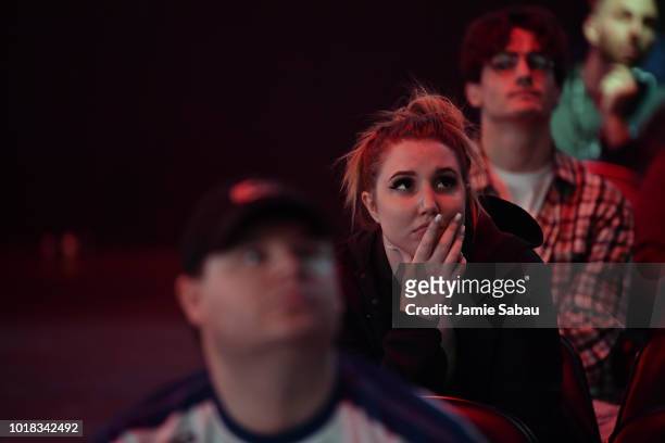 Spectators watch the action on large screens as Rise Nation competes against Team Kaliber during the 2018 Call of Duty World League Championship at...