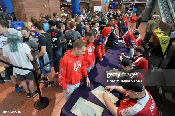 Members of the team eUnited sign autographs for fans during the 2018 Call of Duty World League Championship at Nationwide Arena on August 17, 2018 in...