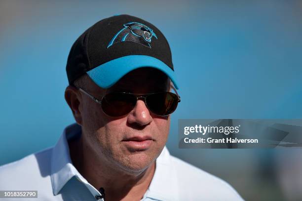 Carolina Panthers owner David Tepper walks the field before their preseason game against the Miami Dolphins at Bank of America Stadium on August 17,...