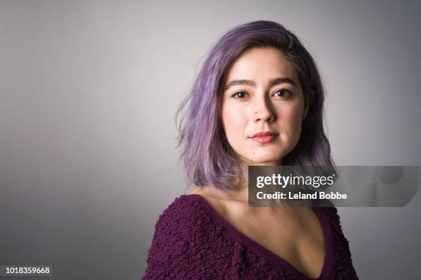 portrait of mixed race adult female with purple hair - a separate peace stock pictures, royalty-free photos & images