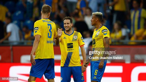 Frederik Tingager, Stephan Fuerstner and Steffen Nkansah of Braunschweig after the 3. Liga match between Eintracht Braunschweig and Karlsruher SC at...