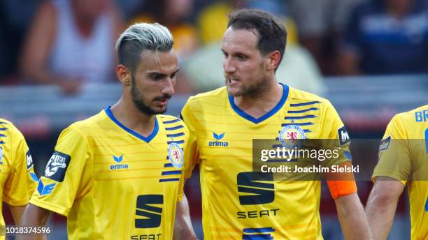 Ivan Franjic, Onur Bulut and Stephan Fuerstner of Braunschweig celebration the goal 1:1 during the 3. Liga match between Eintracht Braunschweig and...