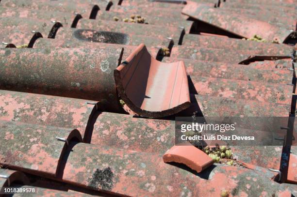 broken terracotta tile - damaged shingles stock pictures, royalty-free photos & images