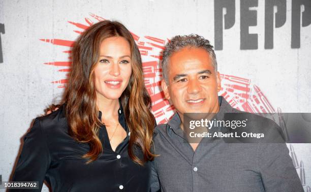 Actress Jennifer Garner and actor John Ortiz attend the Photo Call For STX Films' "Peppermint" held at Four Seasons Hotel Los Angeles at Beverly...