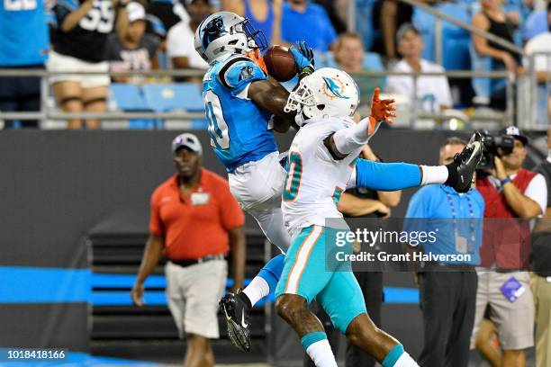 Curtis Samuel of the Carolina Panthers jumps for a catch against Cordrea Tankersley of the Miami Dolphins in the third quarter during the game at...