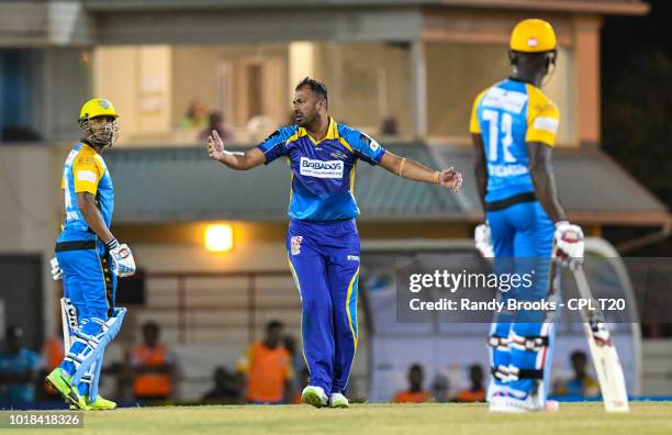 In this handout image provided by CPL T20, Wahab Riaz of Barbados Tridents celebrates the dismissal of Lendl Simmons of St Lucia Stars during match...