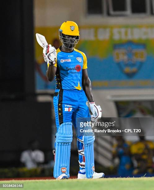 In this handout image provided by CPL T20, Andre Fletcher of St Lucia Stars celebrates his half century during match 10 of the Hero Caribbean Premier...