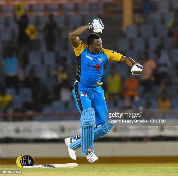 In this handout image provided by CPL T20, Kieron Pollard of St Lucia Stars celebrates his century during match 10 of the Hero Caribbean Premier...