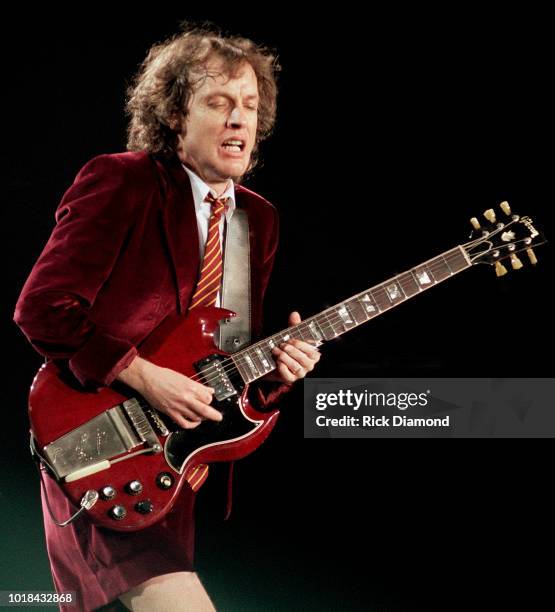 Angus Young of AC/DC performs at The ONMI Coliseum on August 17, 2000 in Atlanta, Georgia.