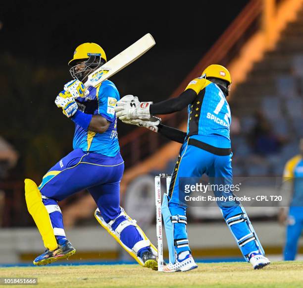In this handout image provided by CPL T20, Dwayne Smith of Barbados Tridents hits 4 during match 10 of the Hero Caribbean Premier League between St...