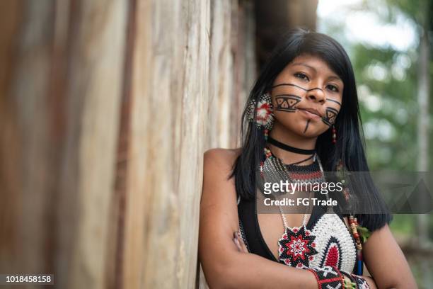 indigenous brazilian young woman, portrait from guarani ethnicity - brazil village stock pictures, royalty-free photos & images