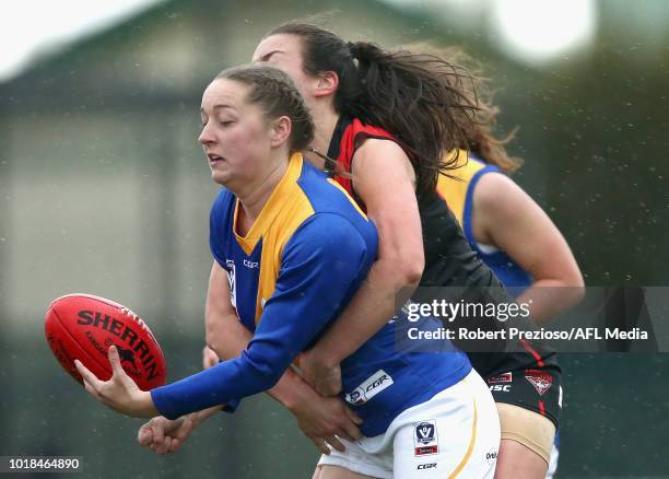 Jacinta Reid of Williamstown is tackled during the VFLW round 15 match between Essendon and Williamstown at Windy Hill on August 18, 2018 in...