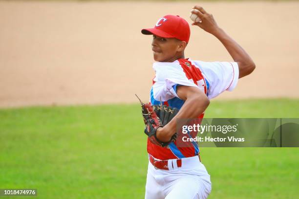 Eccel Correa of Cuba pitches in the 4th inning during the WBSC U-15 World Cup Group B match between South Africa and Cuba at Estadio Rico Cedeno on...