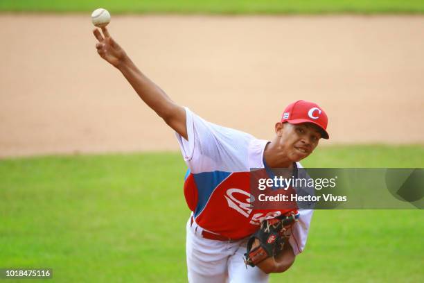 Eccel Correa of Cuba pitches in the 4th inning during the WBSC U-15 World Cup Group B match between South Africa and Cuba at Estadio Rico Cedeno on...