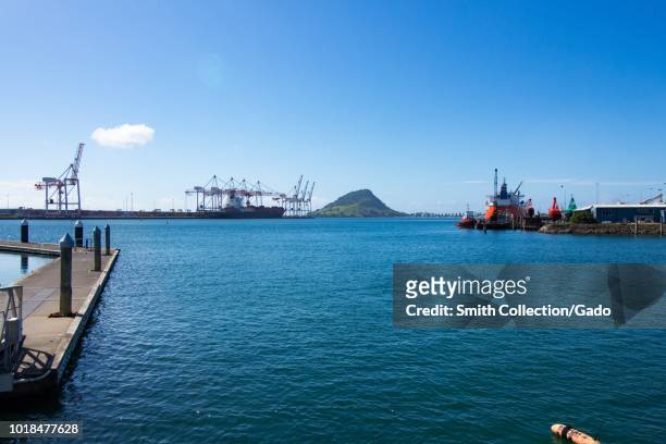 Tauranga harbor, shipyard and Mount Maunganui in the background, Tauranga, North Island, New Zealand, October 30, 2017.