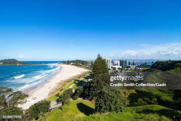 Main beach and the cityscape viewed from Mount Maunganui, Tauranga, North Island, New Zealand, October 30, 2017.