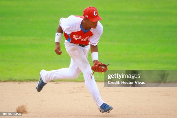 Eriandys Ramon of Cuba catches a ball in the 4th inning during the WBSC U-15 World Cup Group B match between South Africa and Cuba at Estadio Rico...