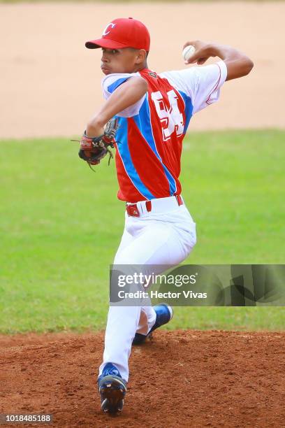 Eccel Correa of Cuba pitches in the 4th inning during the WBSC U-15 World Cup Group B match between South Africa and Cuba at Estadio Rico Cedeno on...