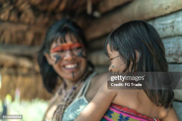 indigenous brazilian sisters, portrait from tupi guarani ethnicity - amazon jungle girl stock pictures, royalty-free photos & images