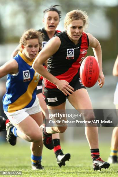 Alexa Madden of Essendon runs during the VFLW round 15 match between Essendon and Williamstown at Windy Hill on August 18, 2018 in Melbourne,...