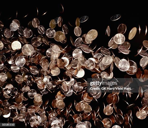 pennies falling down - coins falling stock-fotos und bilder