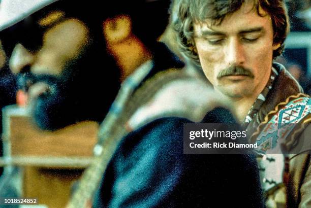 Lamar Williams and Dickey Betts perform at Tampa Stadium Circa 1973 in Tampa, Florida.